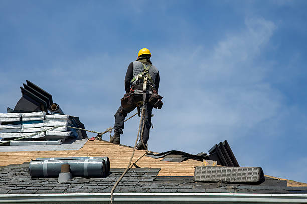 Professional Roof Replacement technician working in Morrisville, NY